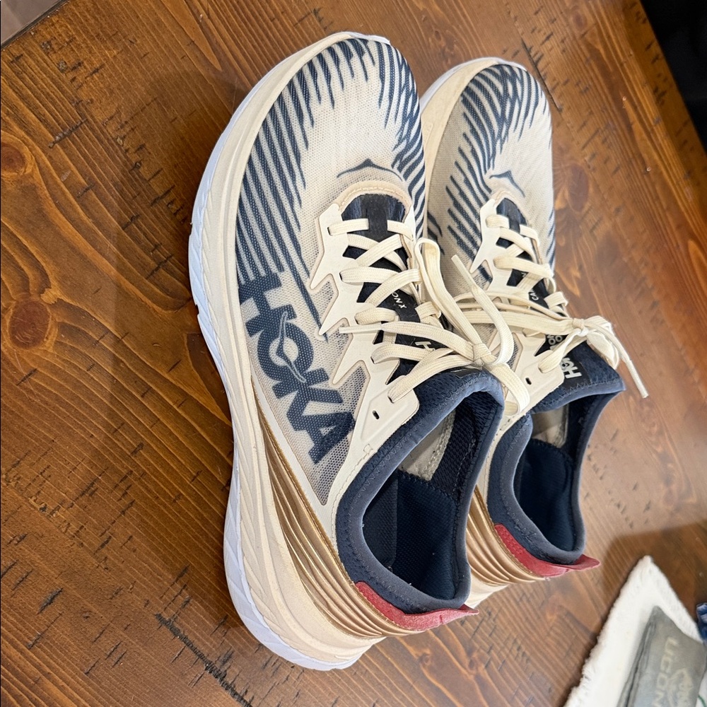 Hoka Cream and Black Athletic Shoes